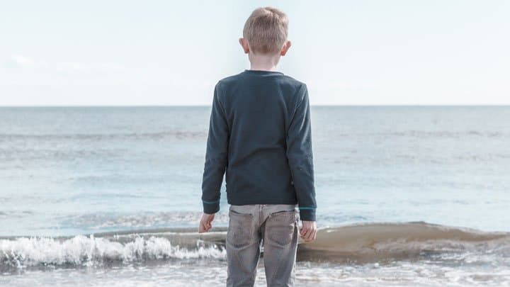 Boy looking at sea