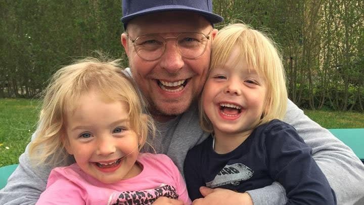 Father with fraternal twins