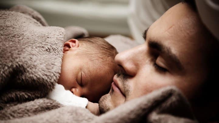 Man with newborn