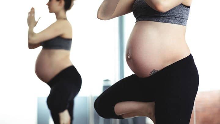 Pregnant woman doing yoga