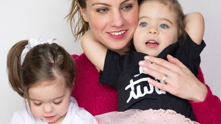 Mum with identical twin girls