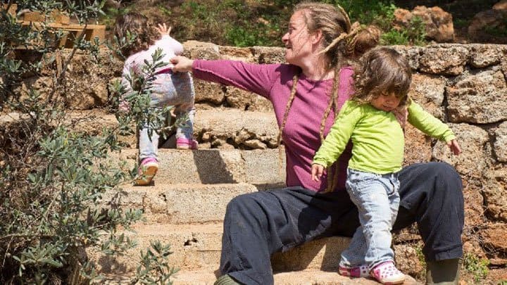 Leyla Gursakarya with twin girl toddlers