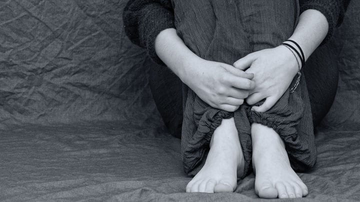 woman sitting down