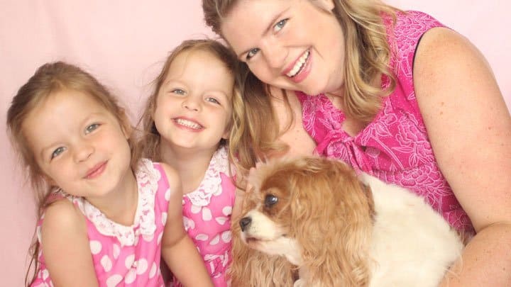 Dog Zoe with Tracy Murdock and identical twin daughters